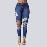 High Waist Jeans with Ripped Hips - The Woman Concept