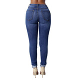 High Waist Jeans with Ripped Hips - The Woman Concept