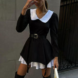 Doll-neck black dress.