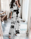 Newspaper printing with belt loose jumpsuit.